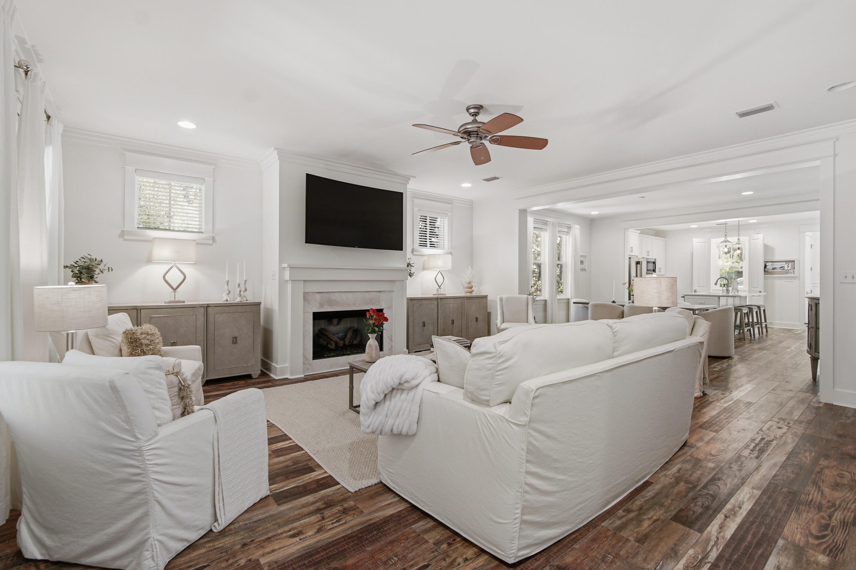 755 Breakers Street, Unit LOT 50 Inlet Beach, FL 32461 - Photo 20 of 61 a living room with furniture a fireplace and a flat screen tv