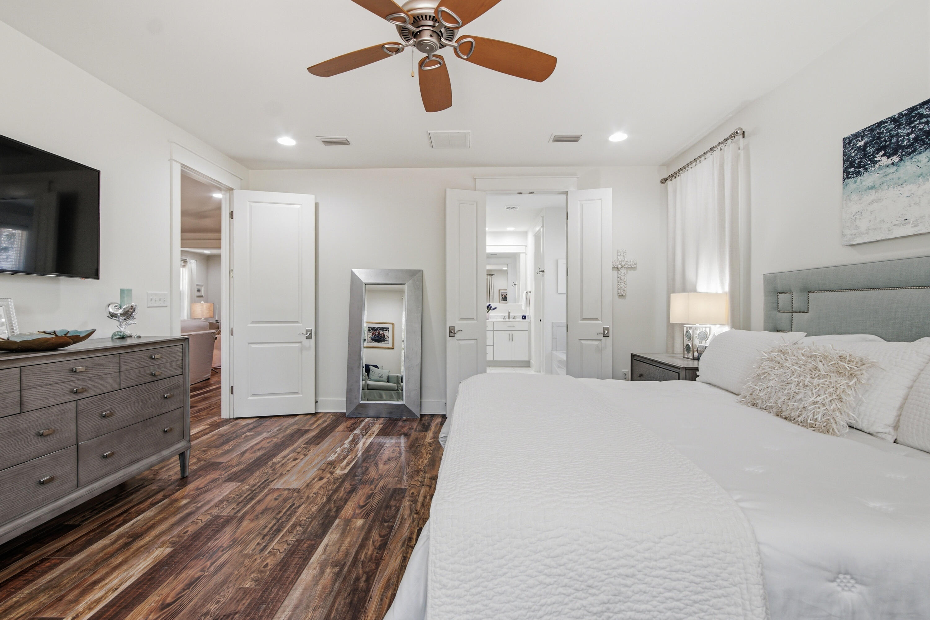 755 Breakers Street, Unit LOT 50 Inlet Beach, FL 32461 - Photo 23 of 61 a bedroom with a bed and a chandelier