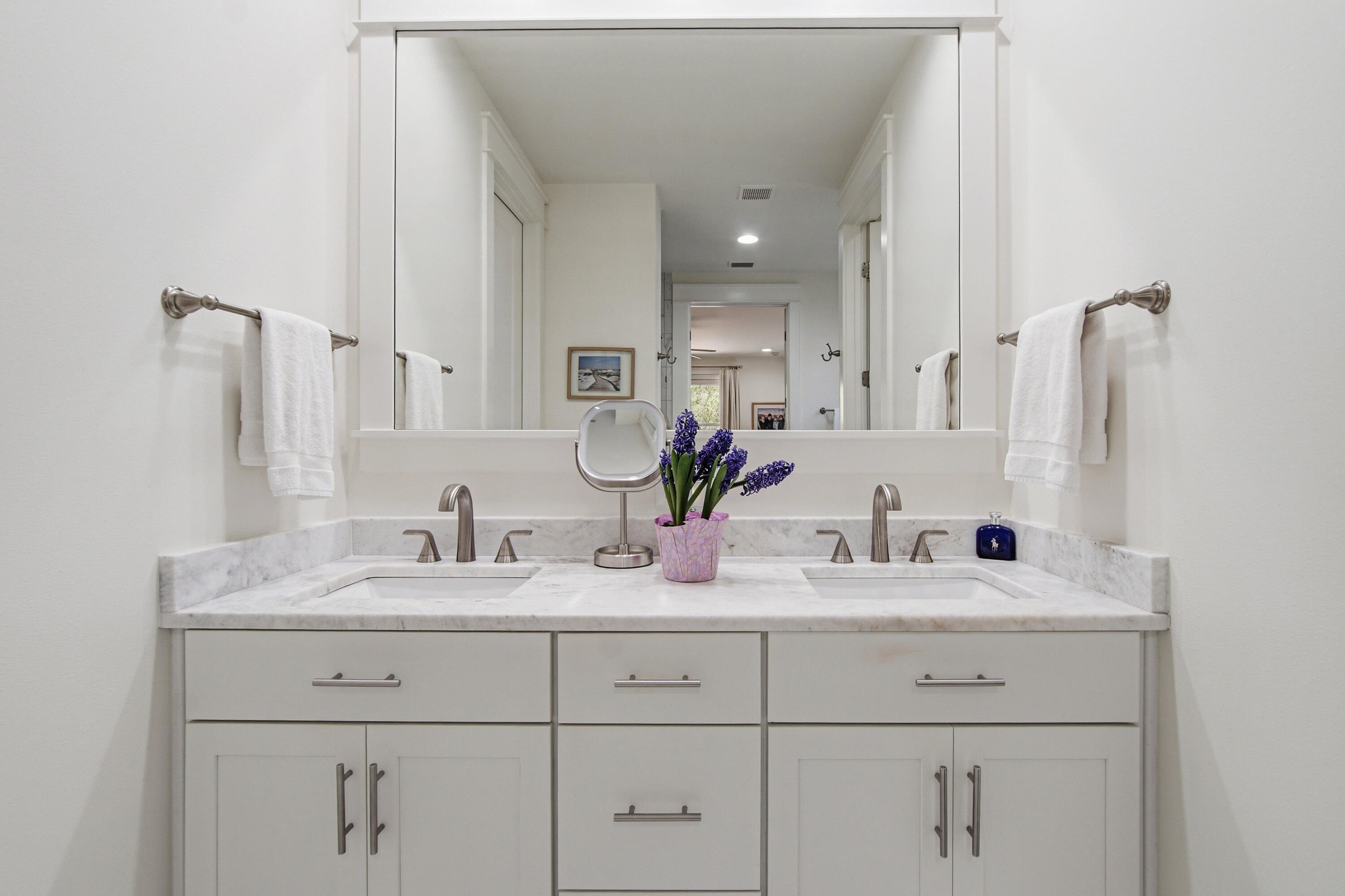 755 Breakers Street, Unit LOT 50 Inlet Beach, FL 32461 - Photo 29 of 61 a bathroom with double sink and a mirror