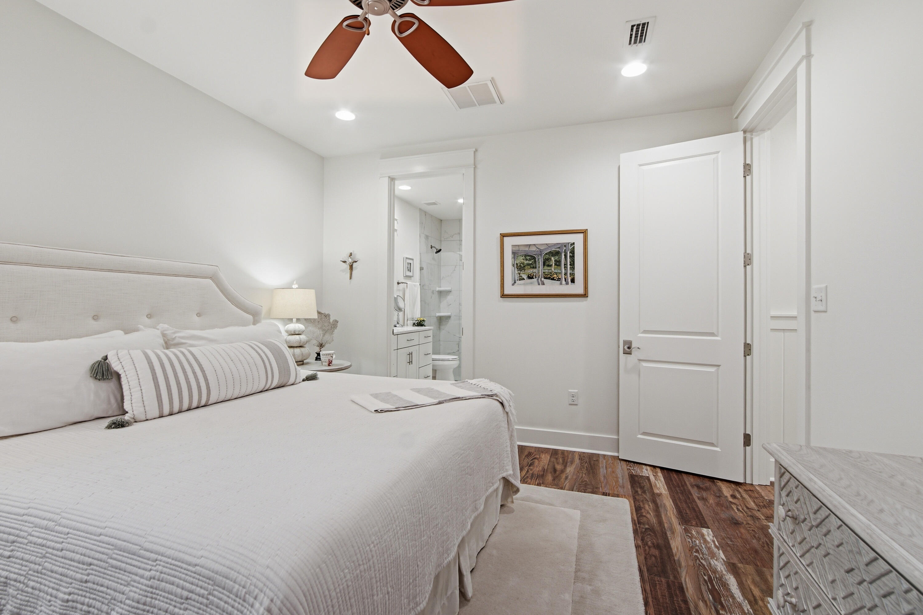 755 Breakers Street, Unit LOT 50 Inlet Beach, FL 32461 - Photo 32 of 61 a bedroom with a bed and painting on the wall