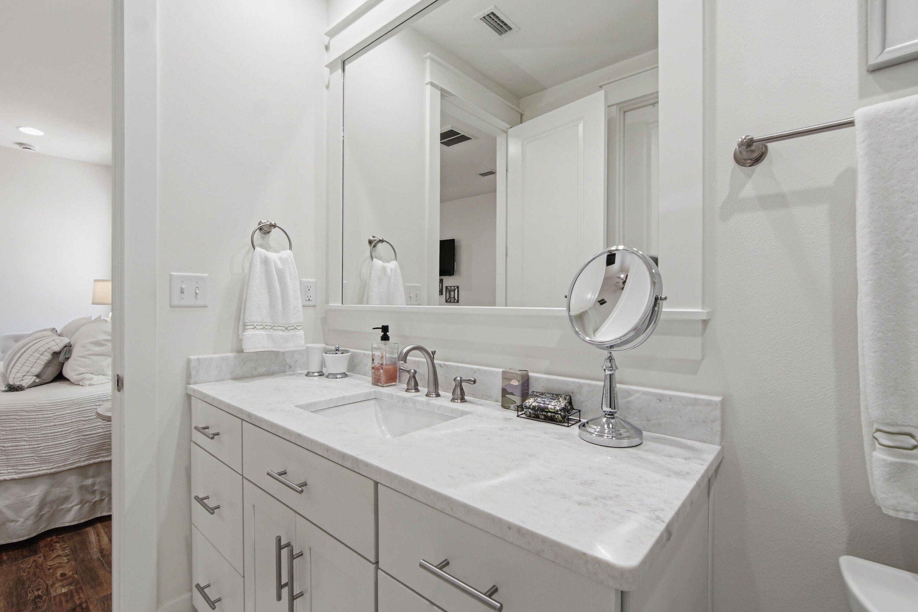 755 Breakers Street, Unit LOT 50 Inlet Beach, FL 32461 - Photo 36 of 61 a bathroom with a sink and a mirror