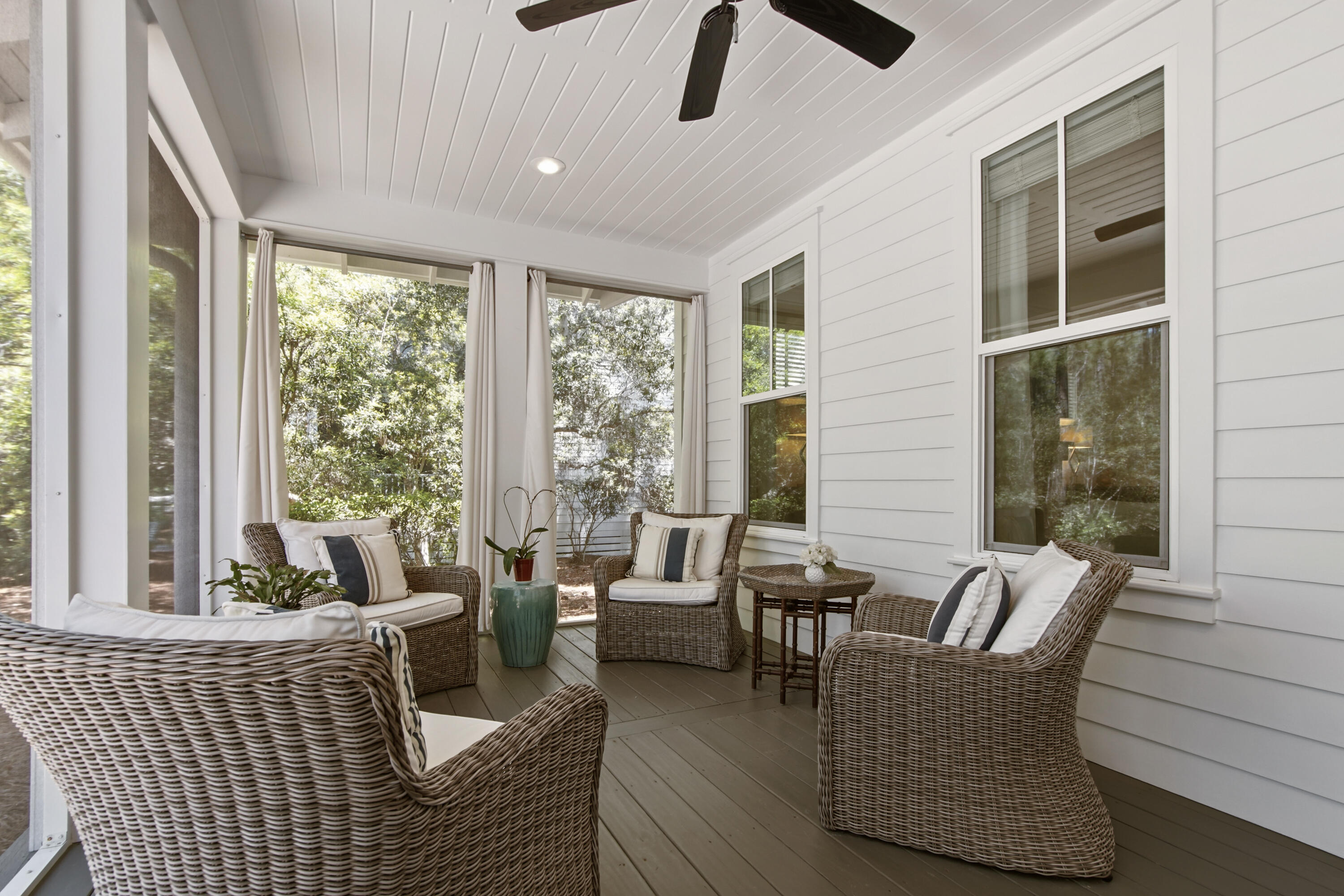 755 Breakers Street, Unit LOT 50 Inlet Beach, FL 32461 - Photo 43 of 61 a living room with furniture and floor to ceiling windows