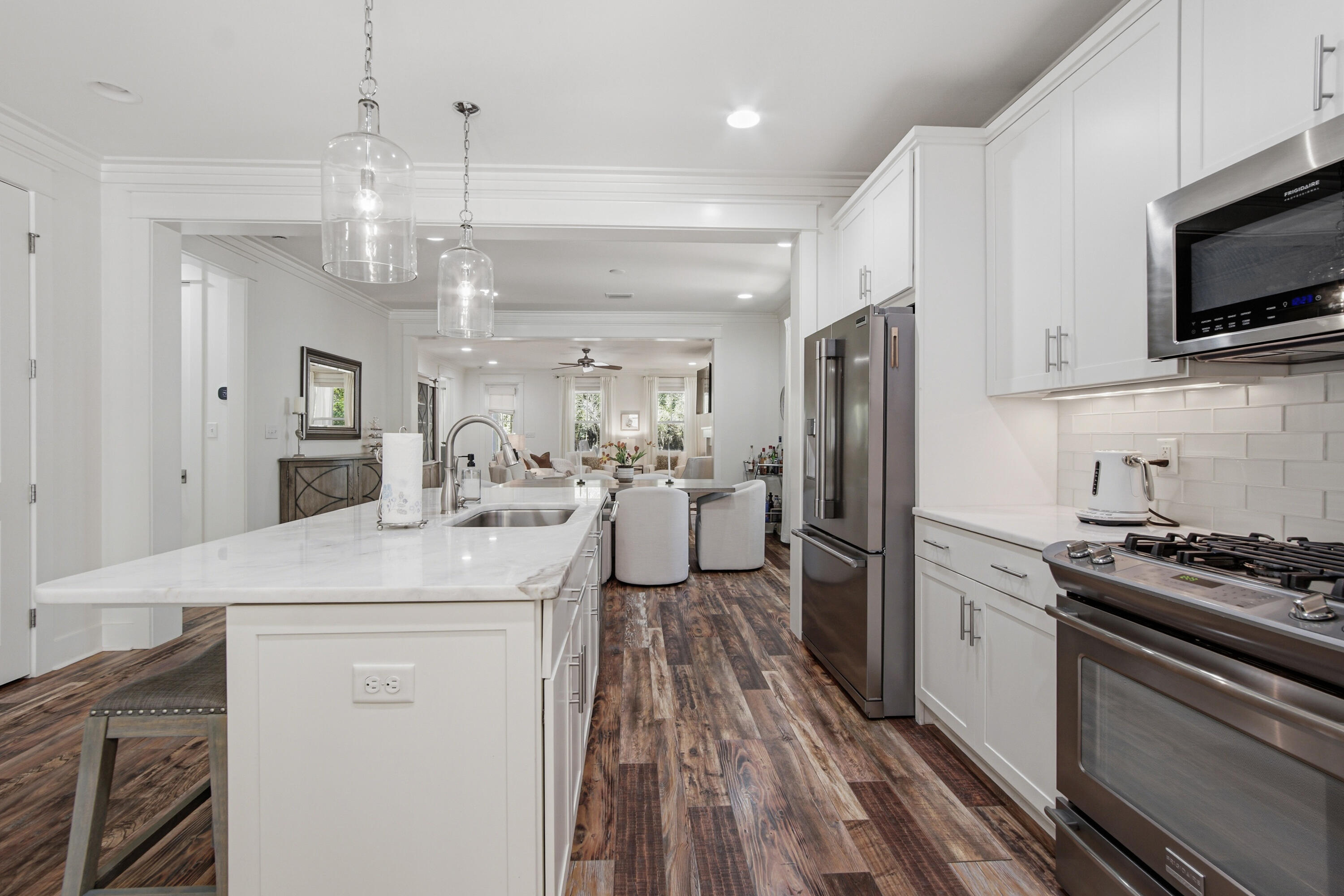755 Breakers Street, Unit LOT 50 Inlet Beach, FL 32461 - Photo 5 of 61 a kitchen with a sink stainless steel appliances and cabinets