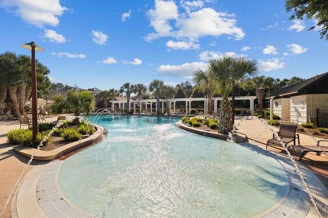 755 Breakers Street, Unit LOT 50 Inlet Beach, FL 32461 - Photo 56 of 61 a view of a swimming pool with a patio and a yard