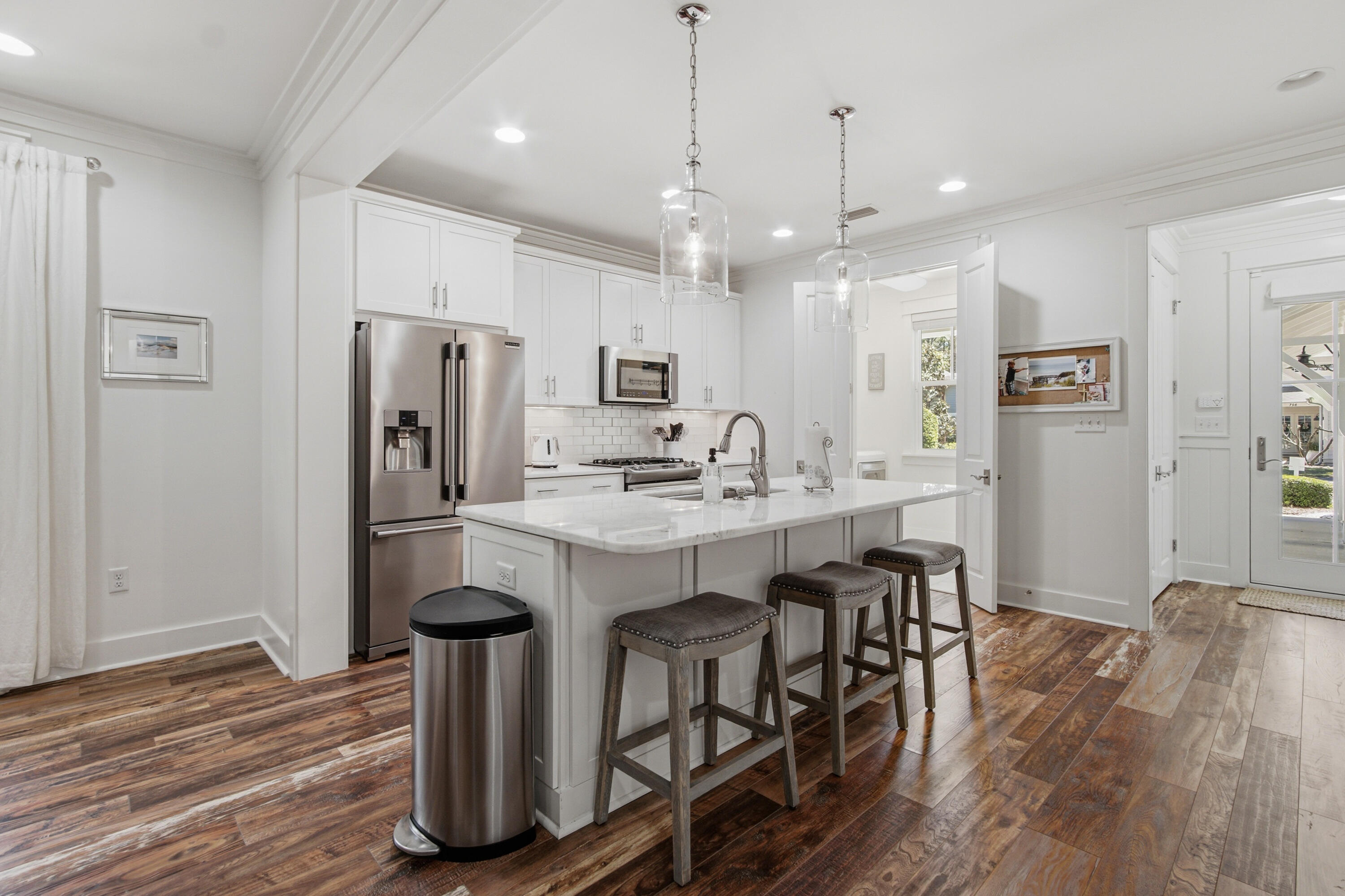 755 Breakers Street, Unit LOT 50 Inlet Beach, FL 32461 - Photo 10 of 61 a kitchen with refrigerator and wooden floor