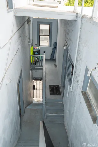 a room with furniture and a large window