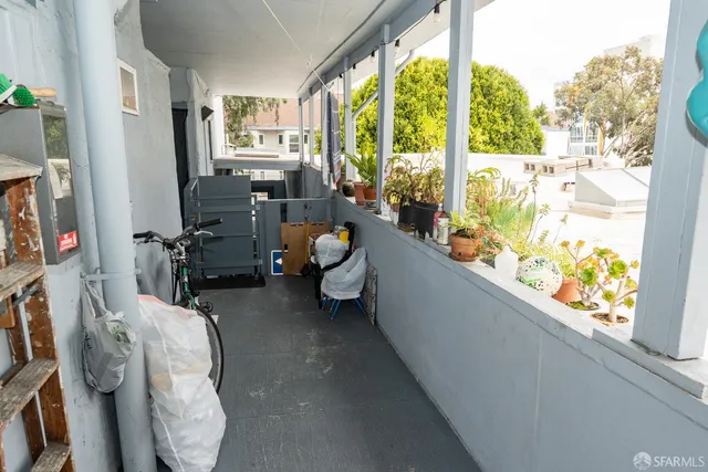 a kitchen with a sink and refrigerator