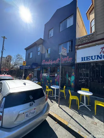 a car parked in front of a building