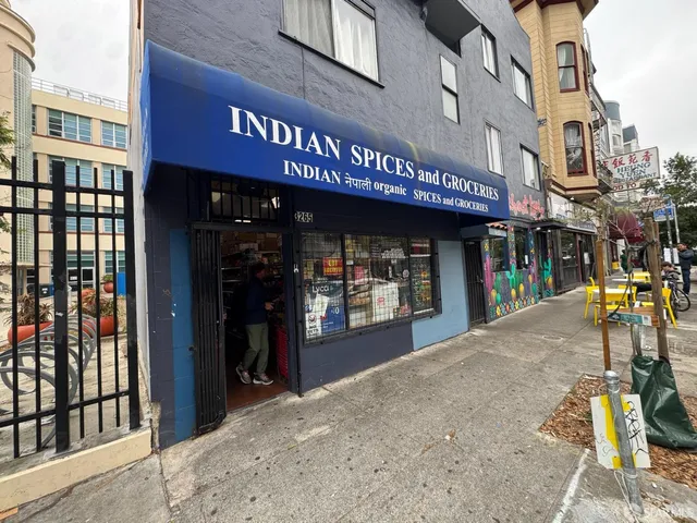 a view of street with shops