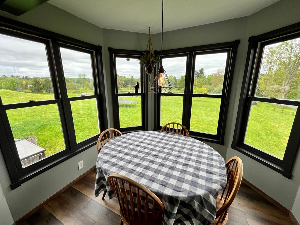 2761 Bush Road Spring Creek, PA 16436 - Photo 23 of 86 a bedroom with a bed window and wooden floor