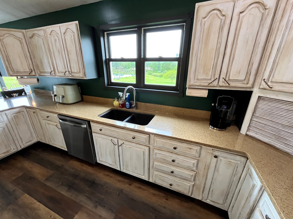 2761 Bush Road Spring Creek, PA 16436 - Photo 34 of 86 a kitchen with appliances cabinets and a sink