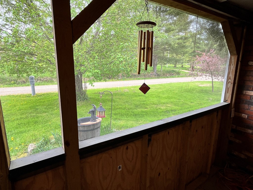 2761 Bush Road Spring Creek, PA 16436 - Photo 42 of 86 a view of a back yard from a window