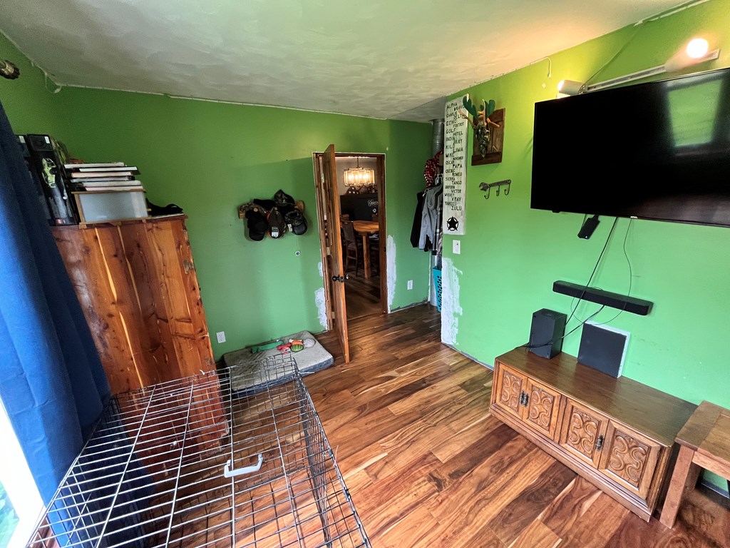 2761 Bush Road Spring Creek, PA 16436 - Photo 46 of 86 a room with furniture and a flat screen tv