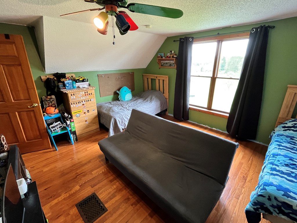 2761 Bush Road Spring Creek, PA 16436 - Photo 57 of 86 a living room with furniture and a flat screen tv