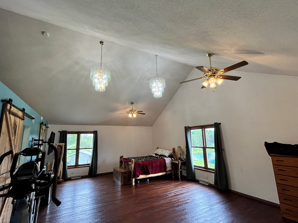 2761 Bush Road Spring Creek, PA 16436 - Photo 66 of 86 a view of a livingroom with furniture and a window