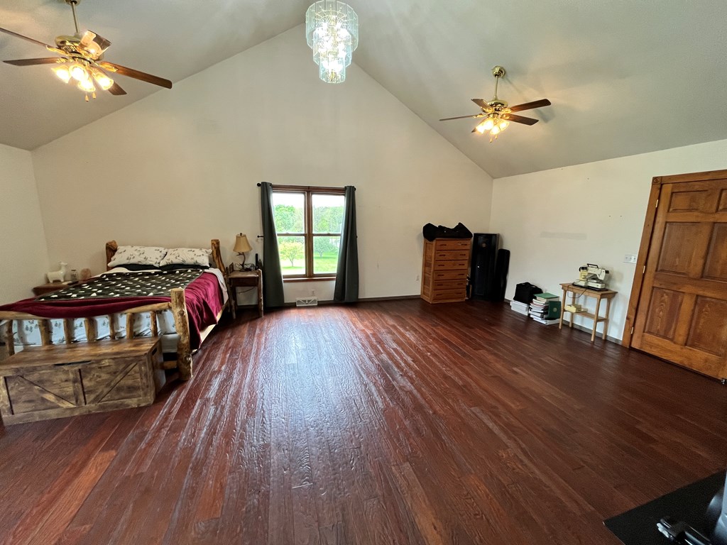 2761 Bush Road Spring Creek, PA 16436 - Photo 74 of 86 a living room with furniture and wooden floor
