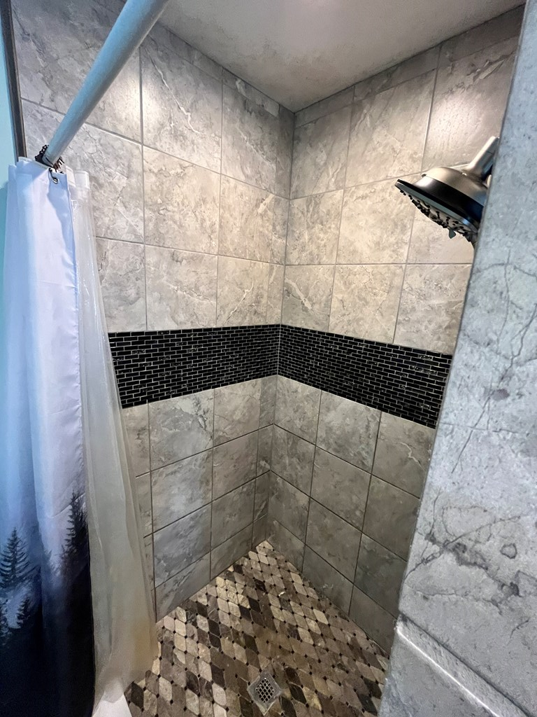 2761 Bush Road Spring Creek, PA 16436 - Photo 80 of 86 a bathroom with a shower