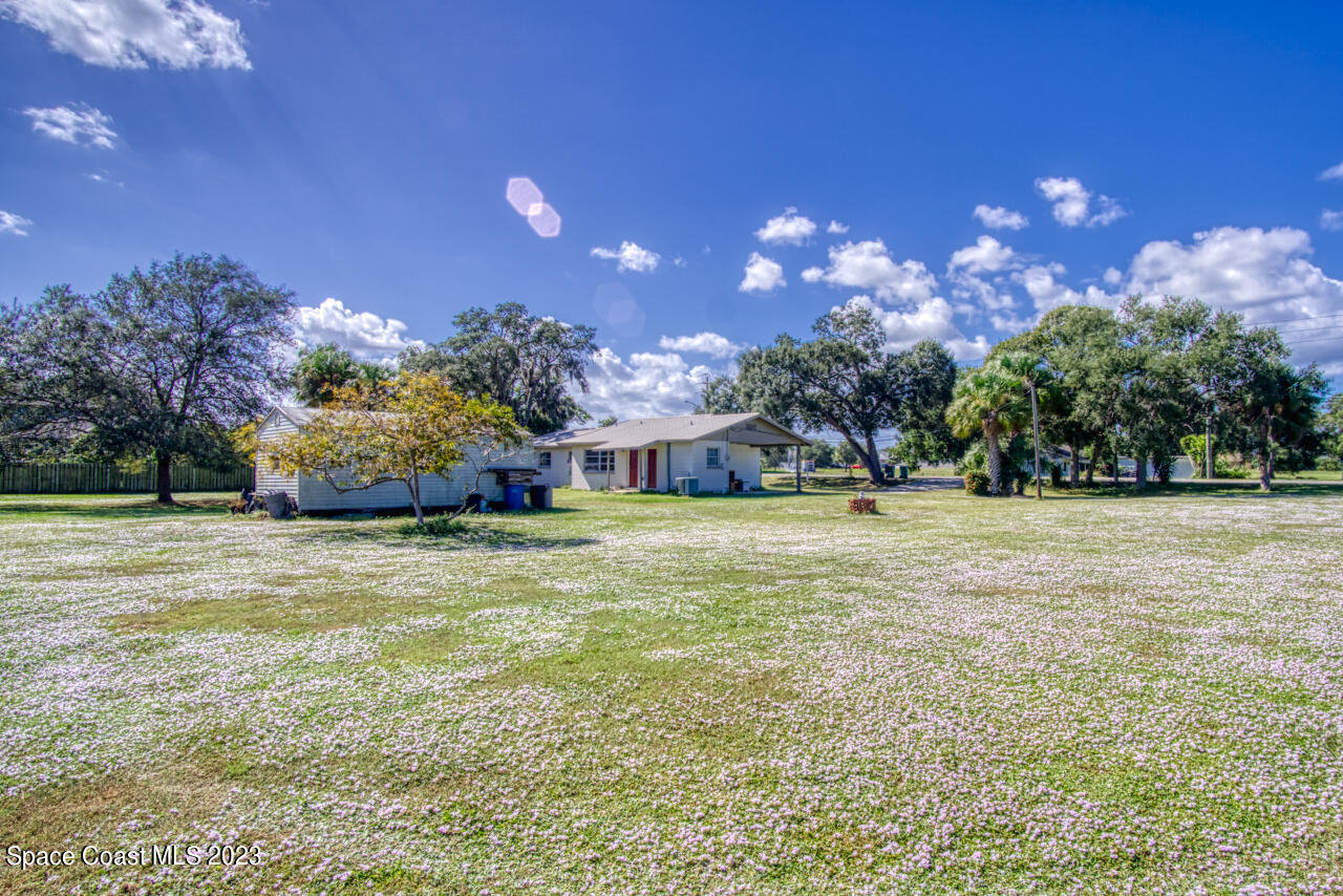 3101 Dairy Road Melbourne, FL 32901 - Photo 19 of 28 a building view with swimming pool