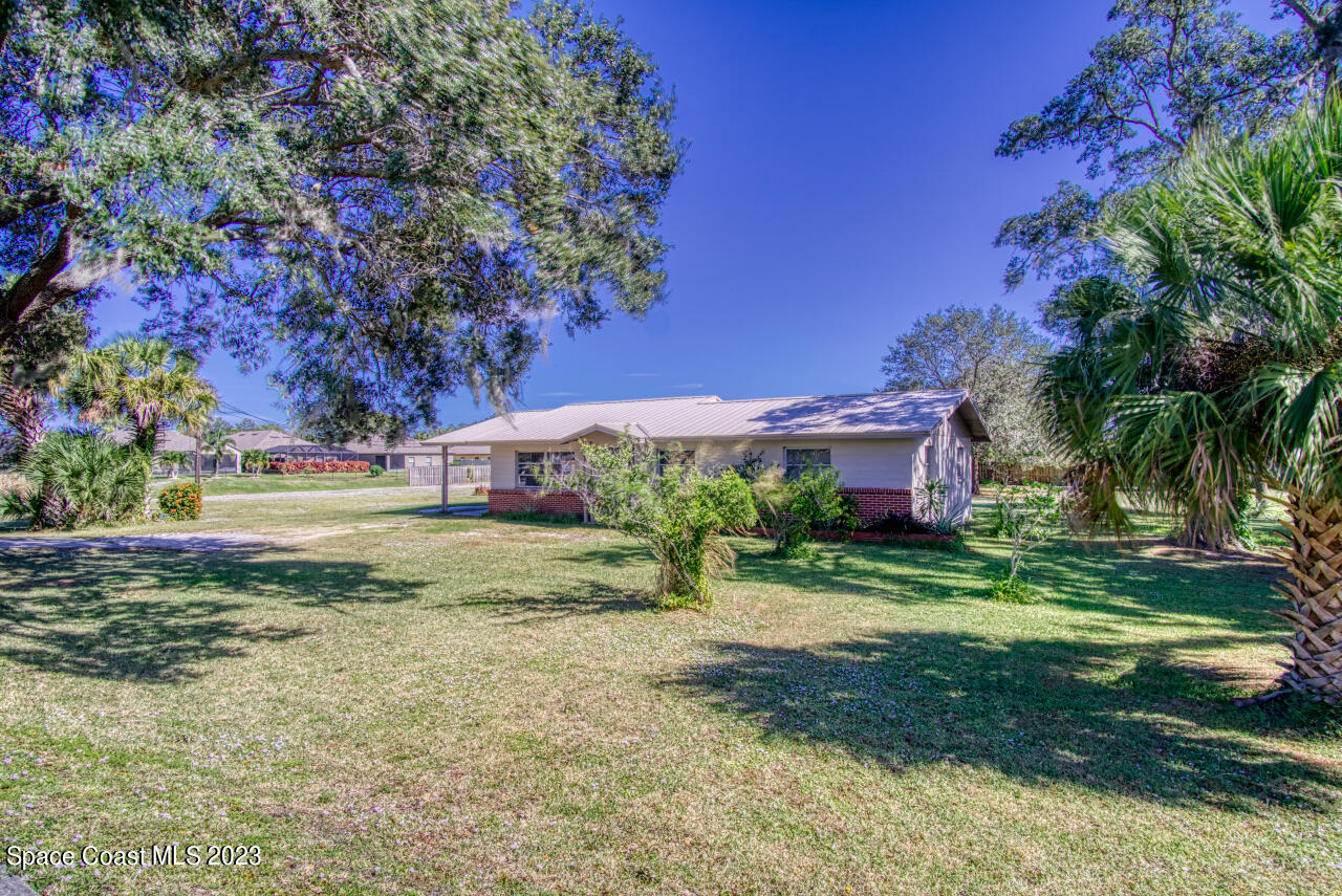 3101 Dairy Road Melbourne, FL 32901 - Photo 20 of 28 a view of a house with a yard