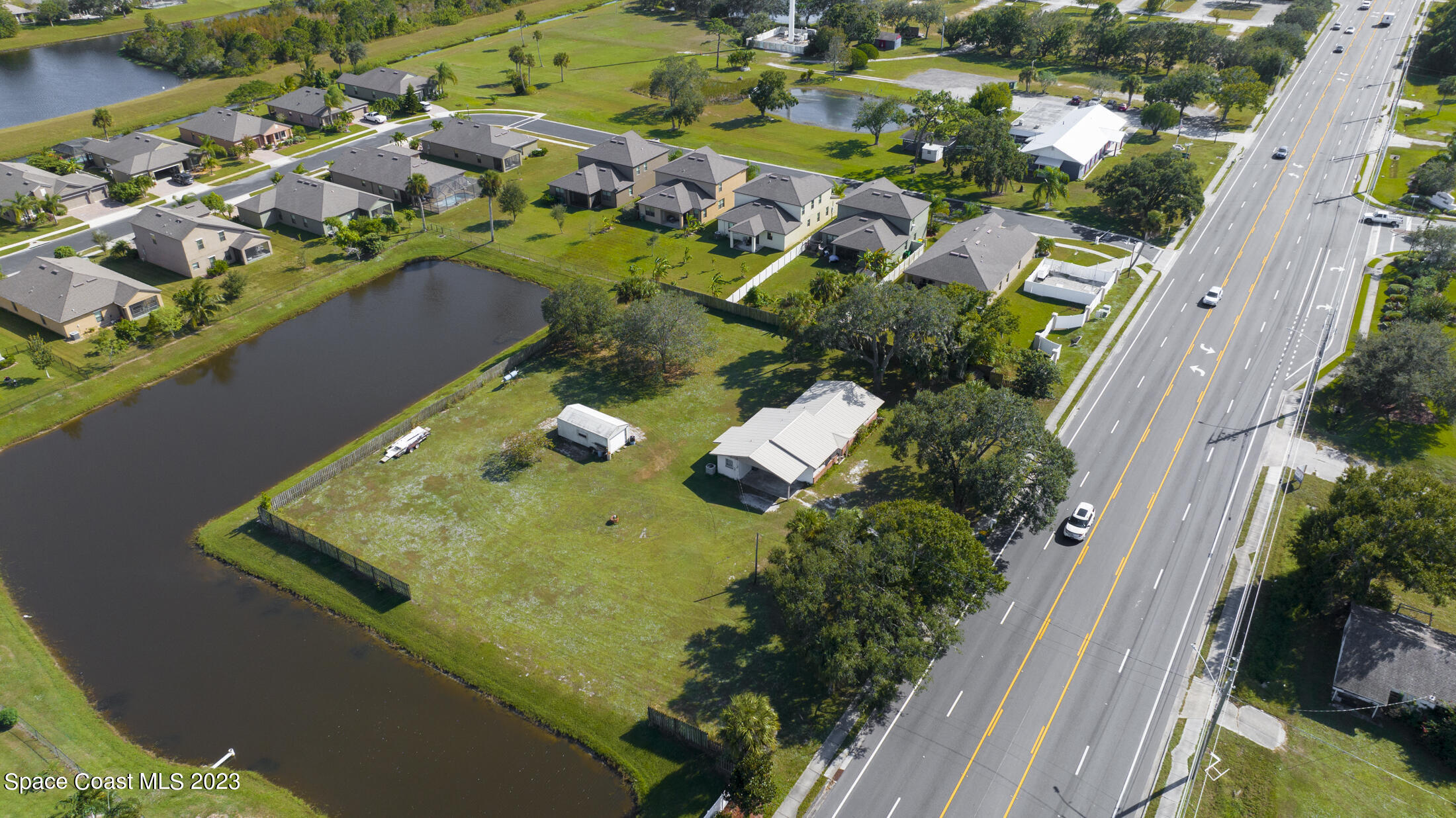 3101 Dairy Road Melbourne, FL 32901 - Photo 21 of 28 an aerial view of a residential houses with outdoor space