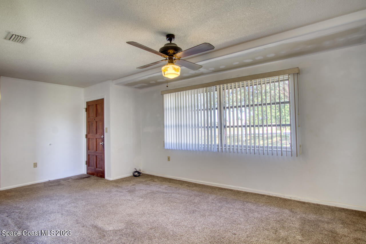 3101 Dairy Road Melbourne, FL 32901 - Photo 4 of 28 a view of an empty room with a window