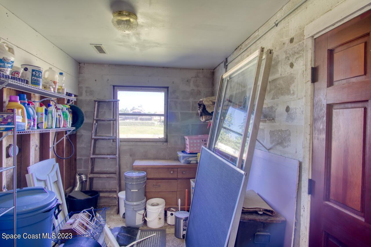 3101 Dairy Road Melbourne, FL 32901 - Photo 9 of 28 a living room with furniture and a window