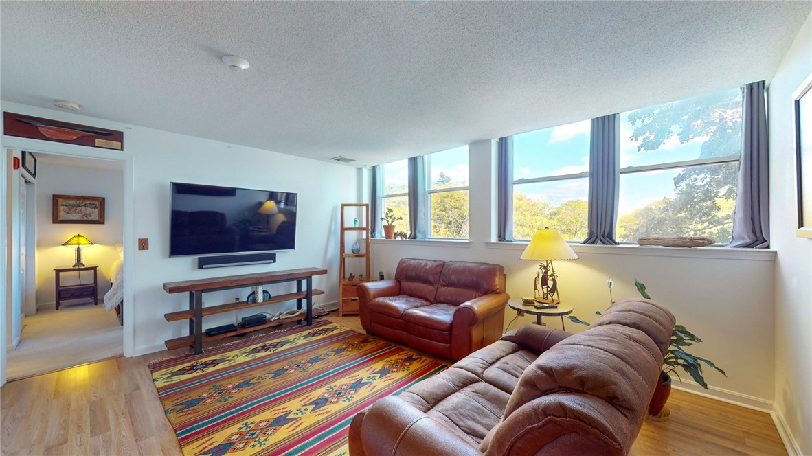 140 High Street, Unit 310 Westerly, RI 02891 - Photo 2 of 23 Tons of natural light in the living room