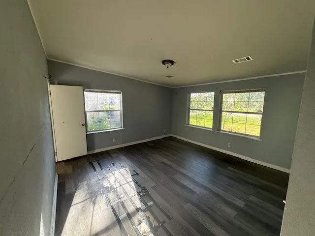 a view of an empty room and window