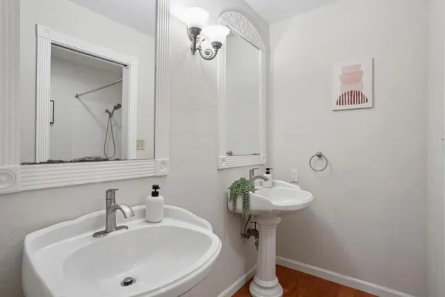 a bathroom with a sink and a mirror