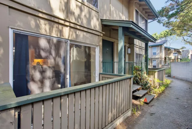 a view of a porch with a bench