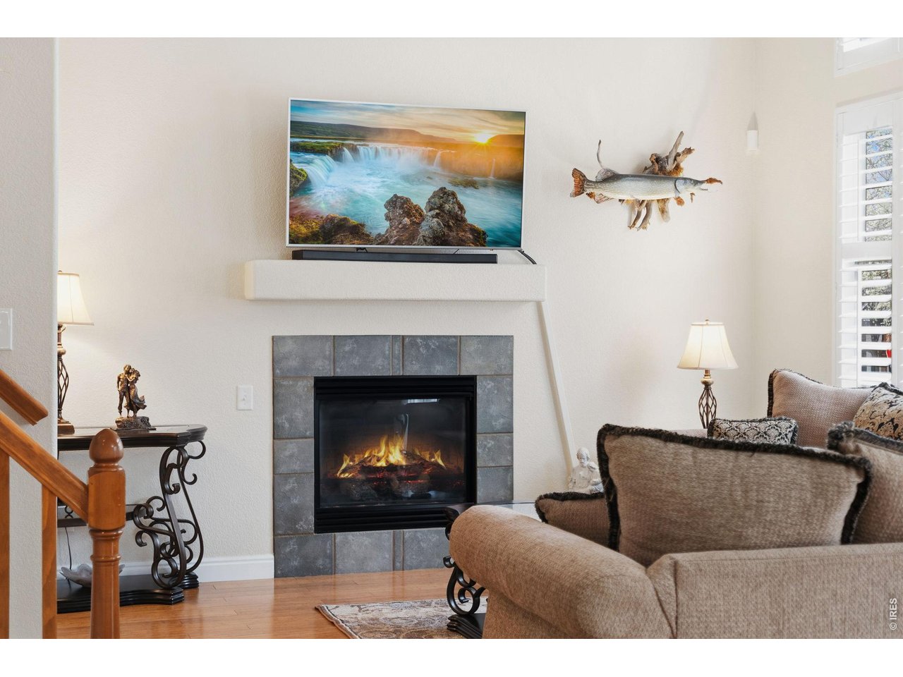 5133 Old Mill Road Fort Collins, CO 80528 - Photo 15 of 39 Living room fire place