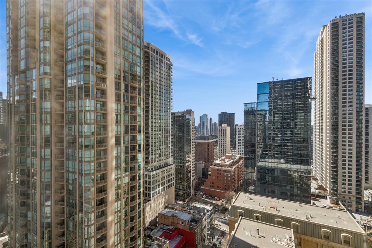 30 East Huron Street, Unit 2204 Chicago, IL 60611 - Photo 21 of 36 a view of a city with tall buildings