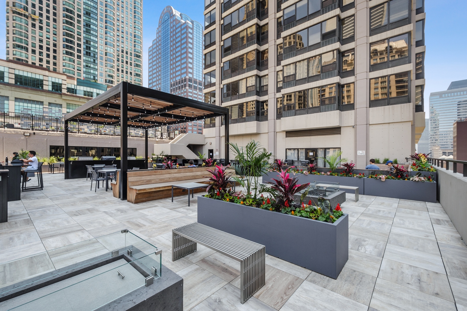 30 East Huron Street, Unit 2204 Chicago, IL 60611 - Photo 25 of 36 a view of a building with outdoor seating