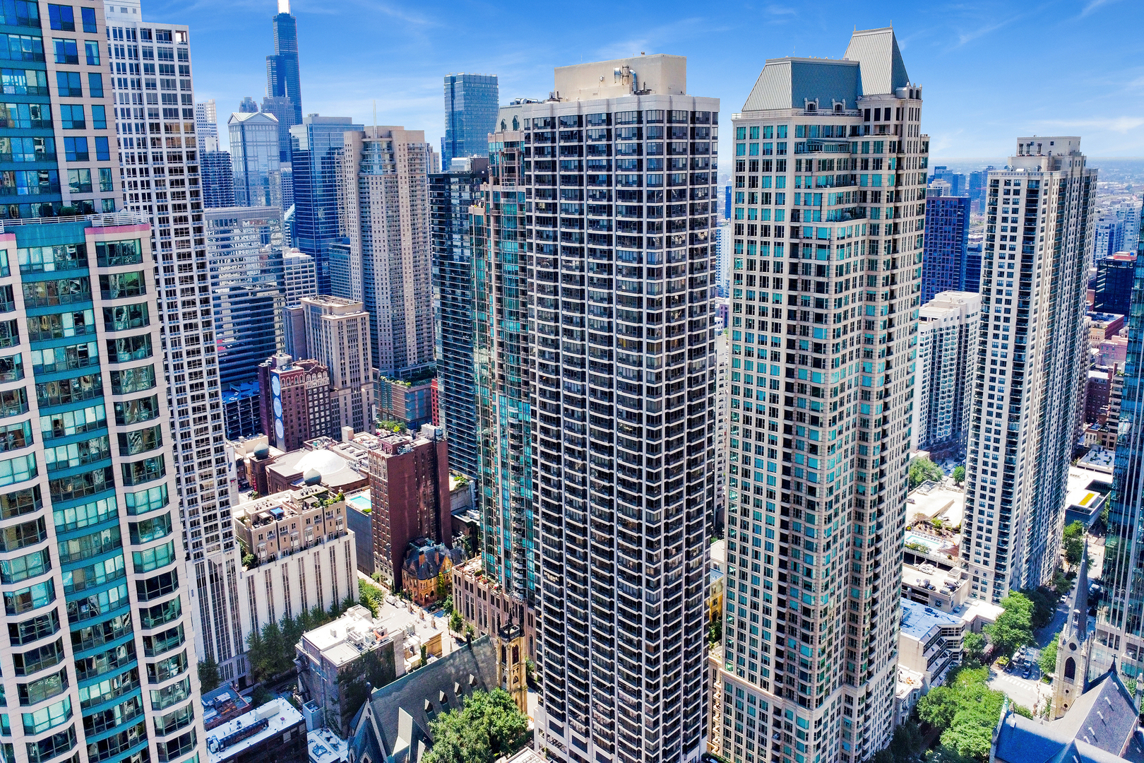 30 East Huron Street, Unit 2204 Chicago, IL 60611 - Photo 35 of 36 a city view with tall buildings