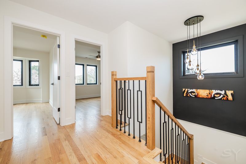2247 South 6th Avenue North Riverside, IL 60546 - Photo 23 of 57 a view of a hallway with wooden floor and stairs