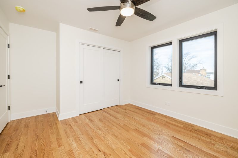 2247 South 6th Avenue North Riverside, IL 60546 - Photo 27 of 57 a view of an empty room with window and wooden floor