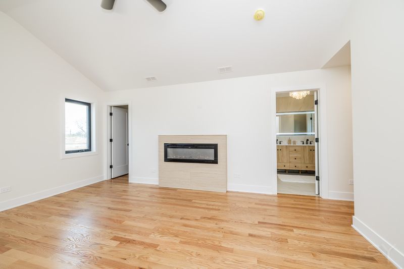 2247 South 6th Avenue North Riverside, IL 60546 - Photo 32 of 57 a view of an empty room with wooden floor and a window