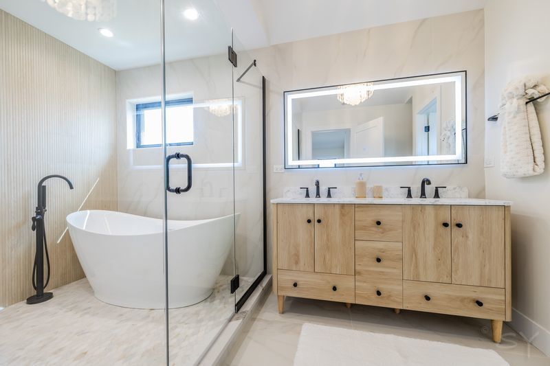 2247 South 6th Avenue North Riverside, IL 60546 - Photo 33 of 57 a bathroom with a double vanity sink mirror and bathtub
