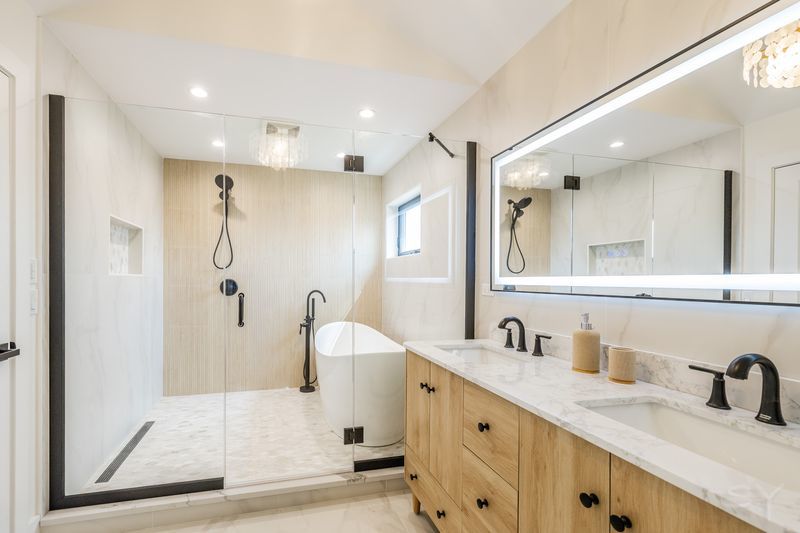 2247 South 6th Avenue North Riverside, IL 60546 - Photo 35 of 57 a bathroom with a double vanity sink mirror and shower