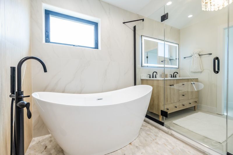 2247 South 6th Avenue North Riverside, IL 60546 - Photo 37 of 57 a white bath tub sitting in a bathroom