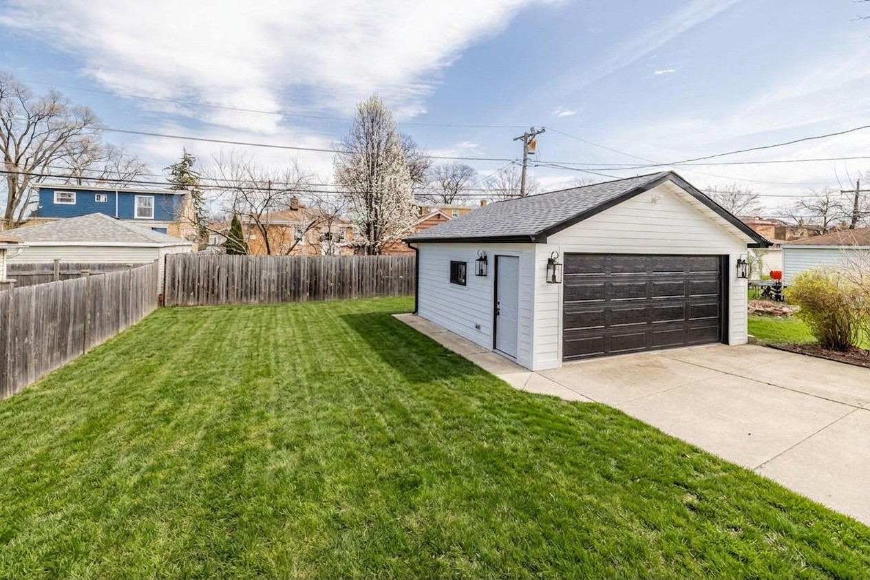 2247 South 6th Avenue North Riverside, IL 60546 - Photo 55 of 57 a front view of a house with a yard