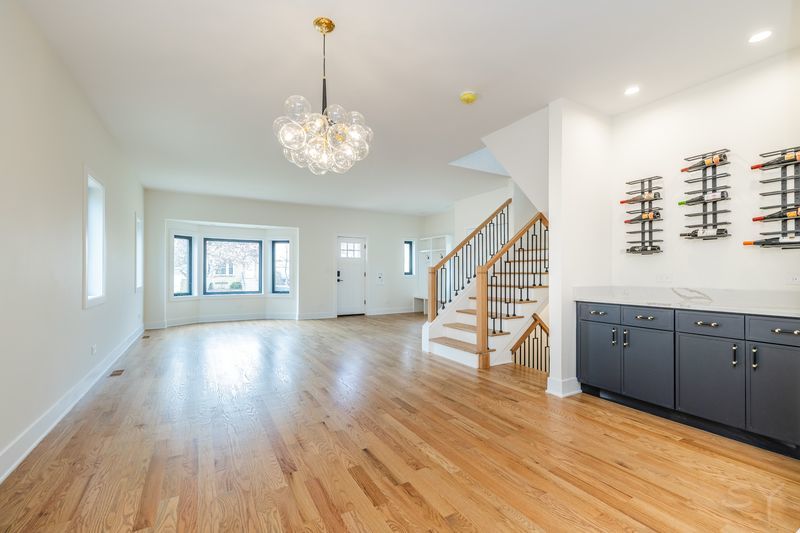 2247 South 6th Avenue North Riverside, IL 60546 - Photo 6 of 57 a view of an empty room with wooden floor and a window