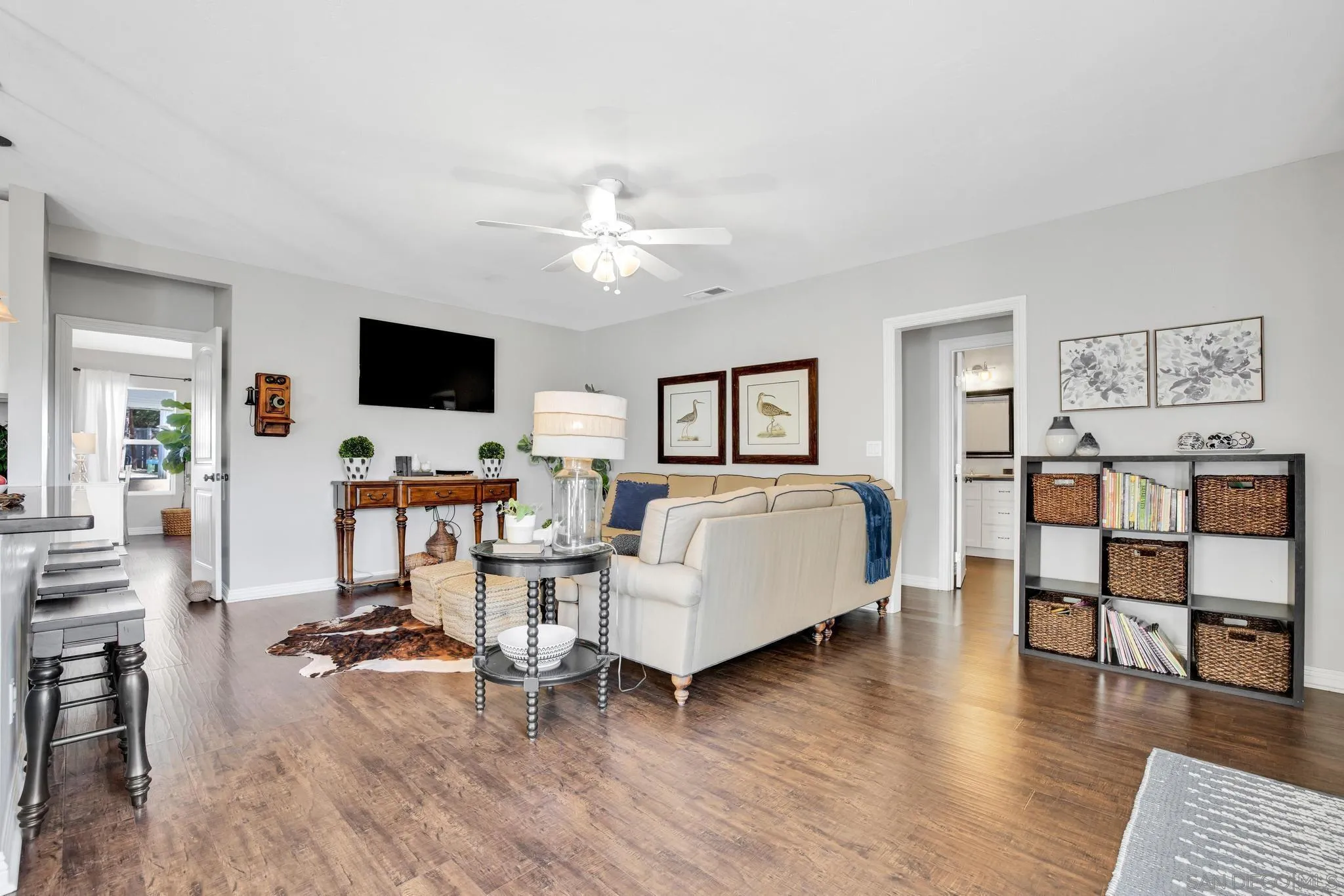 14409 Rios Canyon Road El Cajon, CA 92021 - Photo 11 of 47 a living room with furniture and a flat screen tv