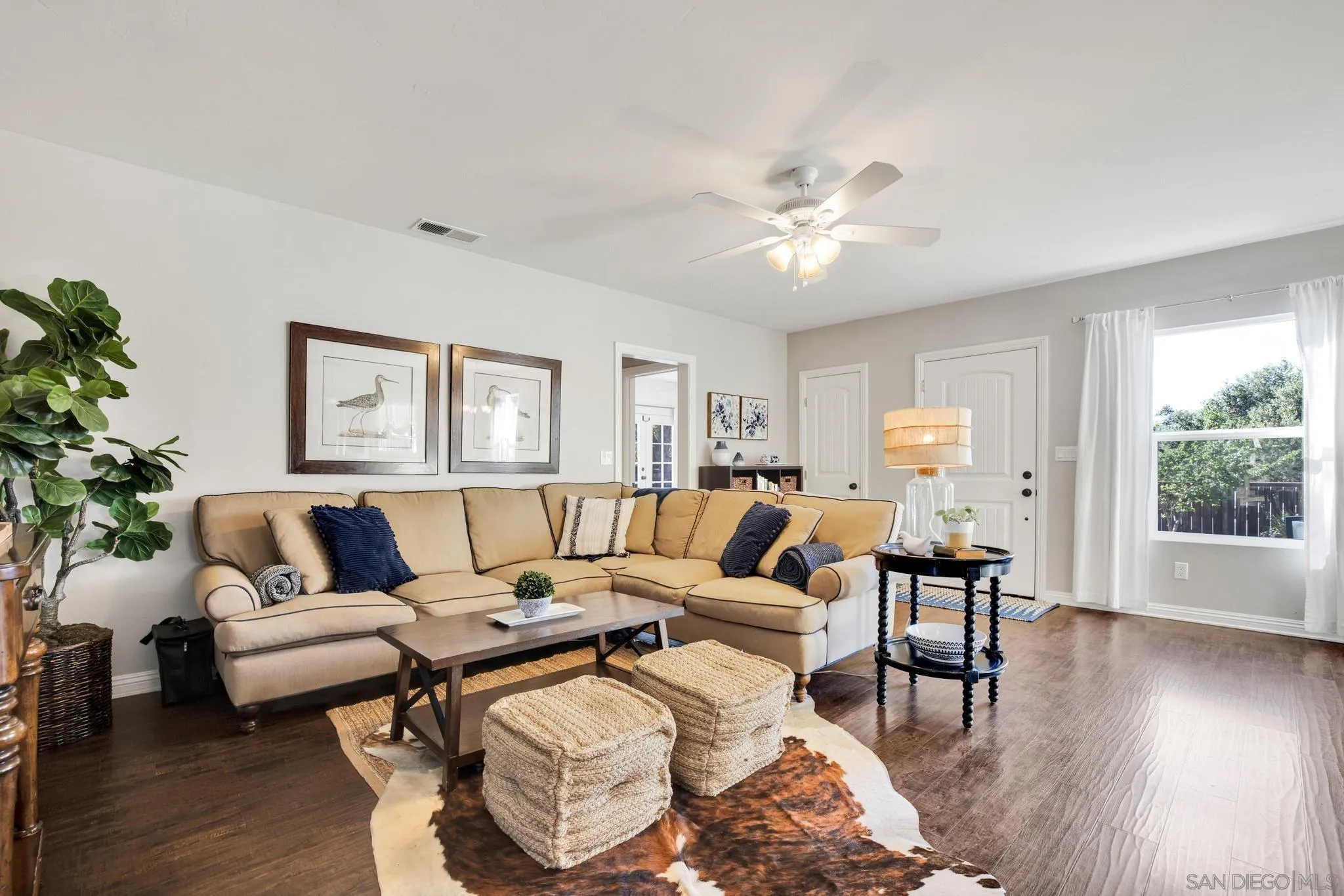 14409 Rios Canyon Road El Cajon, CA 92021 - Photo 12 of 47 a living room with furniture and a large window