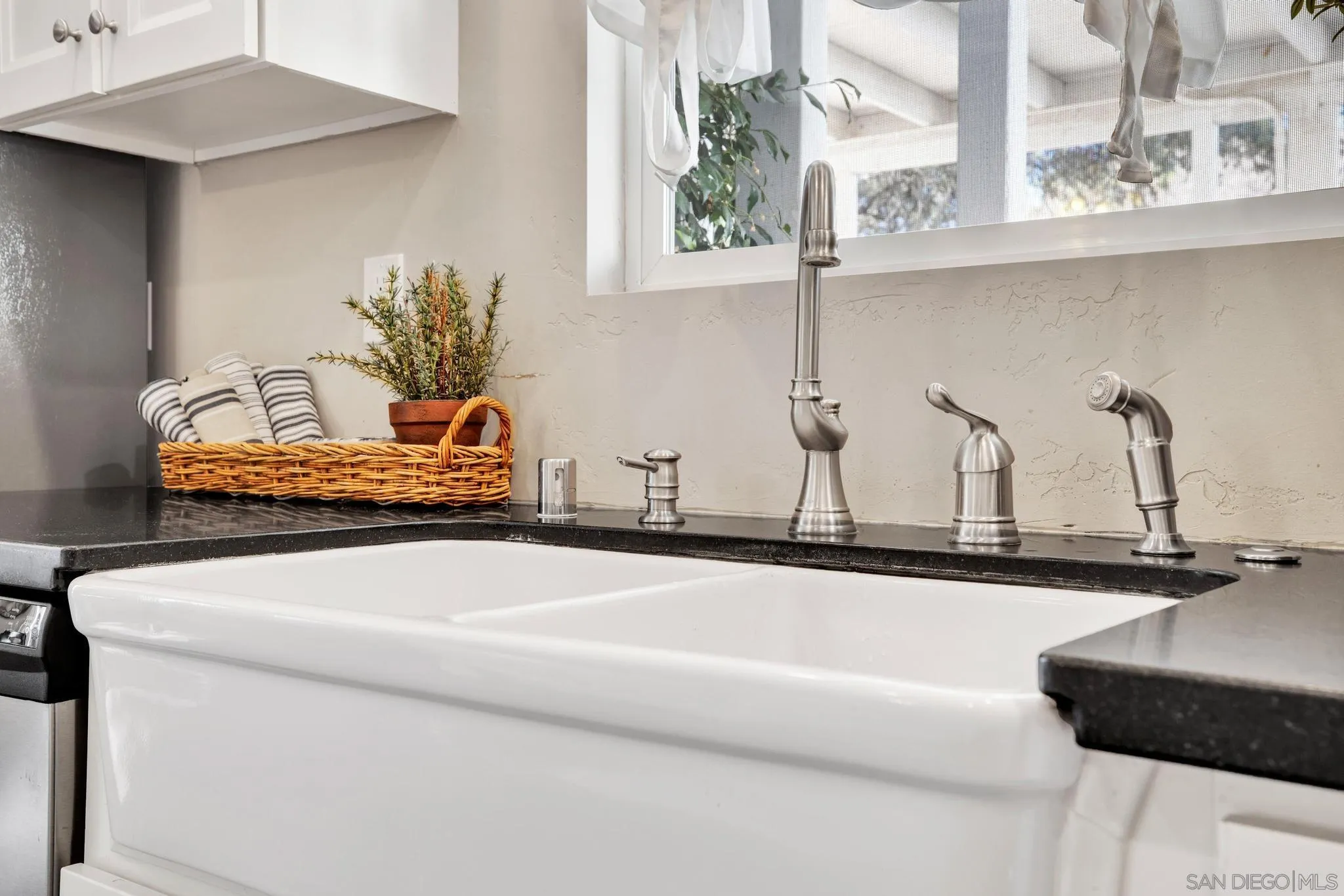 14409 Rios Canyon Road El Cajon, CA 92021 - Photo 17 of 47 a close view of sink and tap