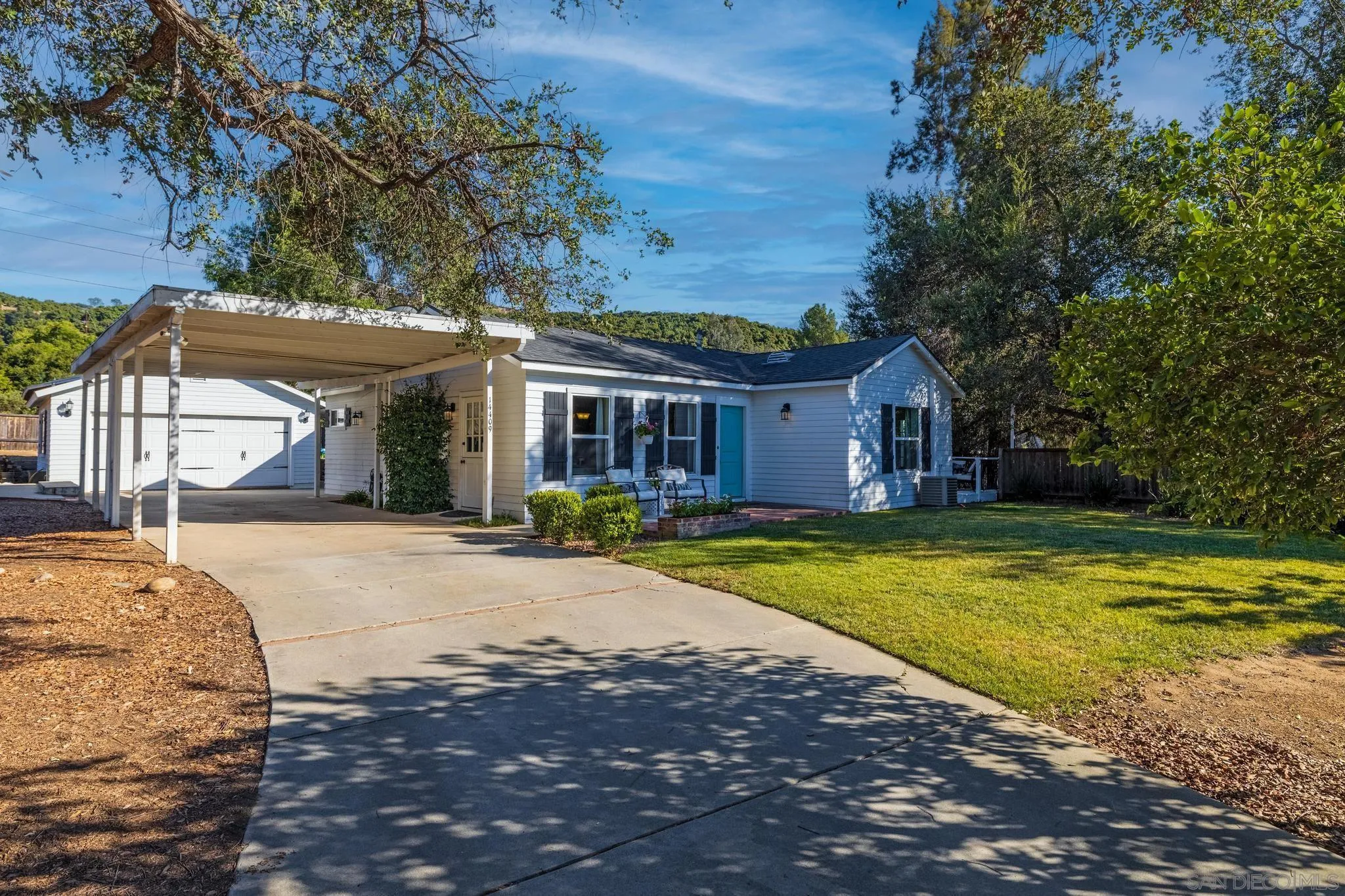 14409 Rios Canyon Road El Cajon, CA 92021 - Photo 41 of 47 a view of a house with swimming pool