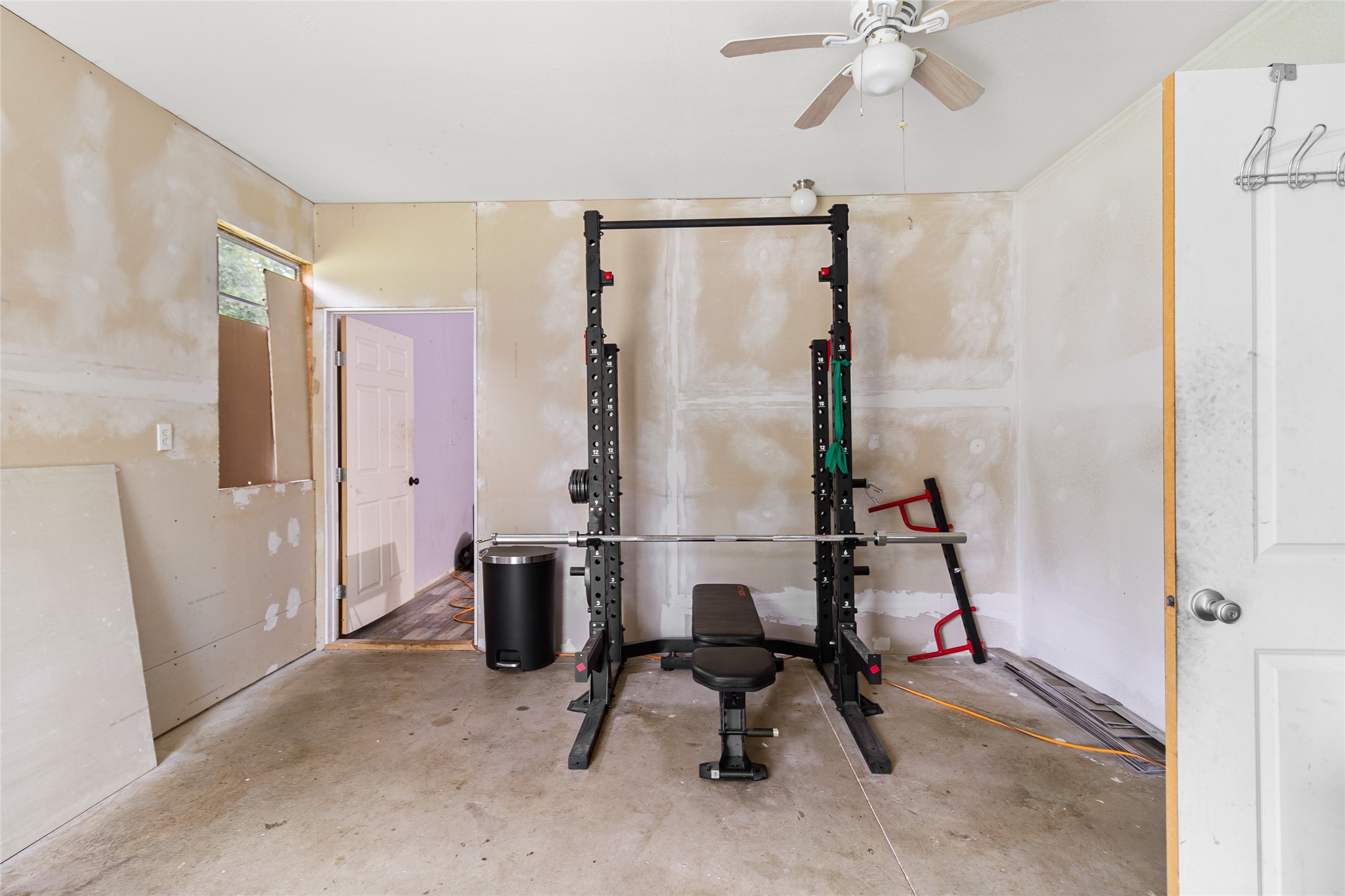 228 Geneva Road Huntsville, TX 77320 - Photo 17 of 26 a view of entryway with workspace and windows