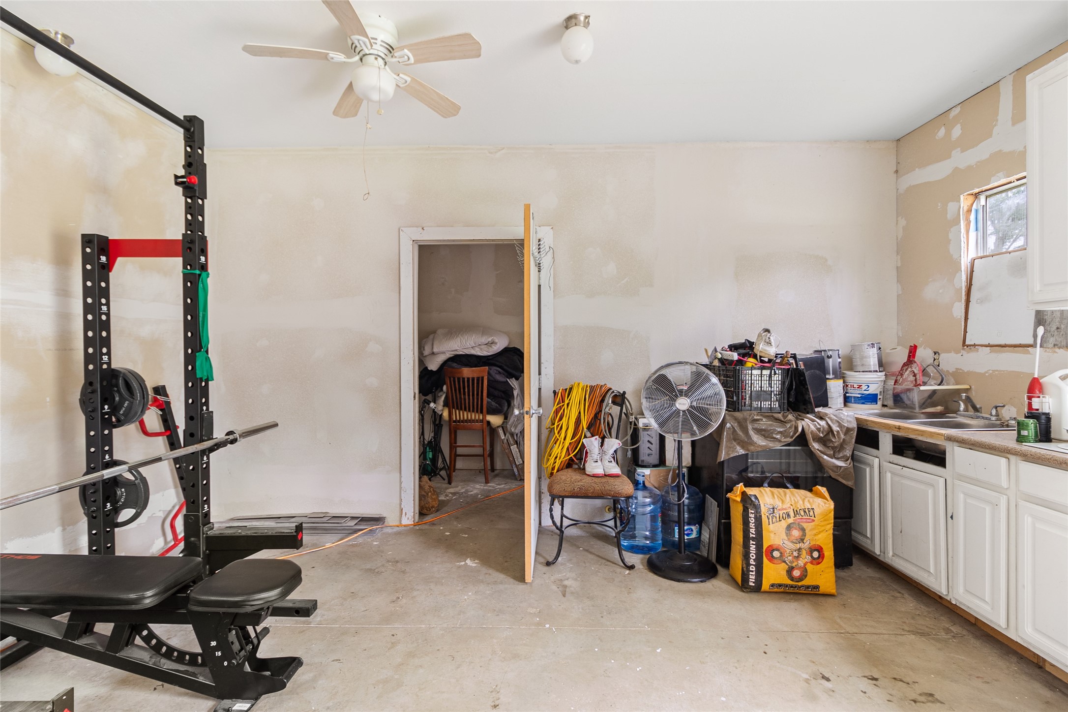 228 Geneva Road Huntsville, TX 77320 - Photo 18 of 26 a view of a room with gym equipment