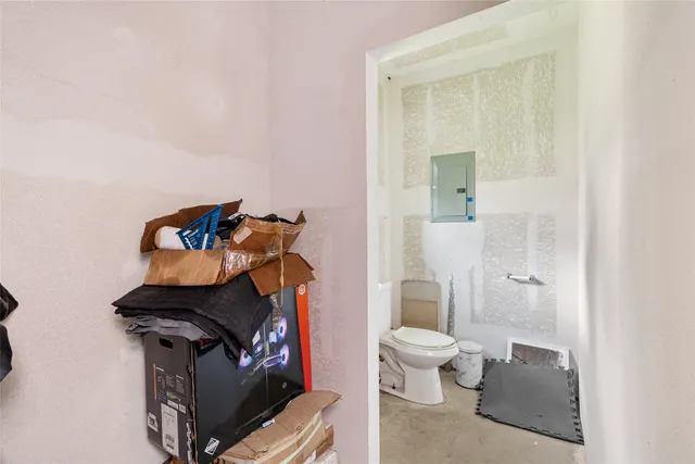 a living room with furniture and a gate