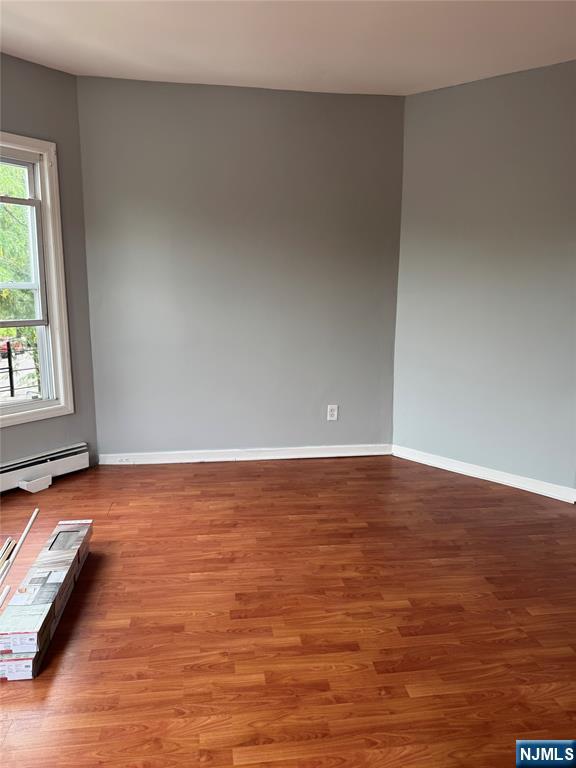 157 3rd Street, Unit 155 Newark, NJ 07107 - Photo 2 of 12 a view of an empty room and window